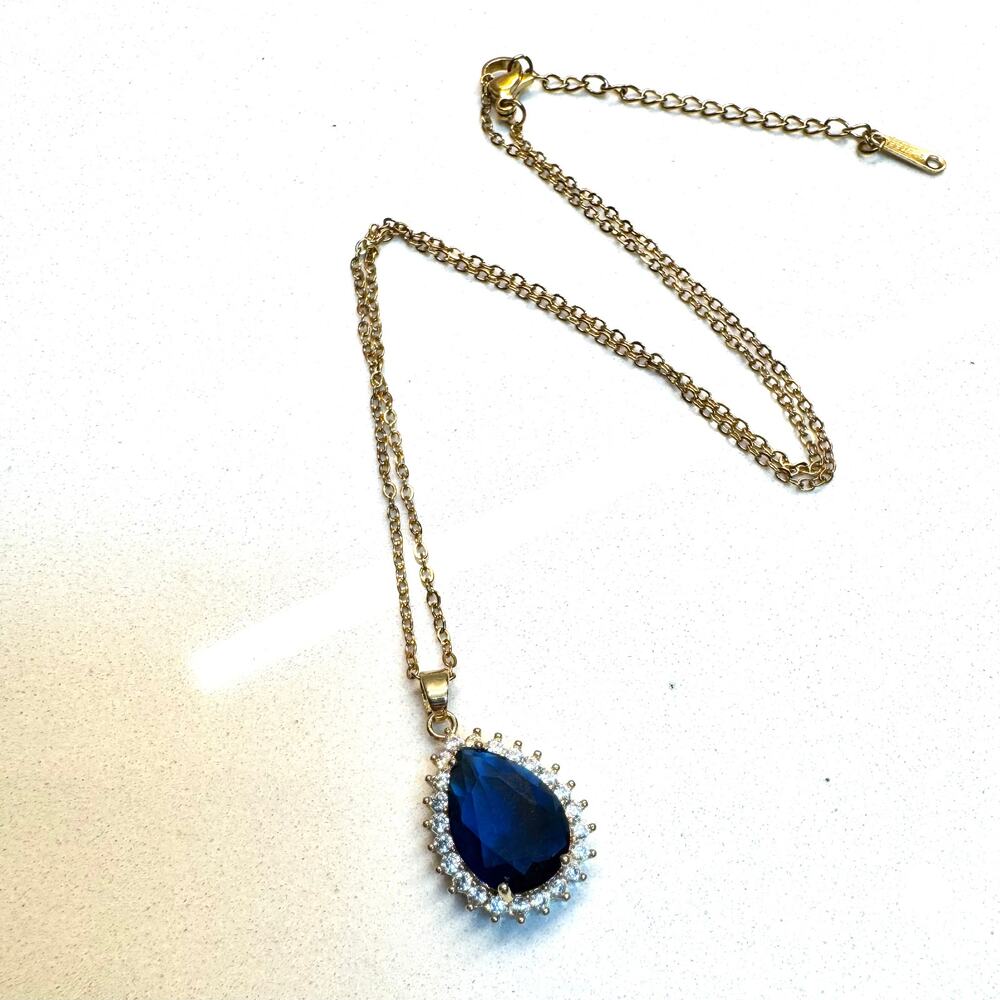 Gold Tone Blue Teardrop Crystal Halo Pendant Necklace